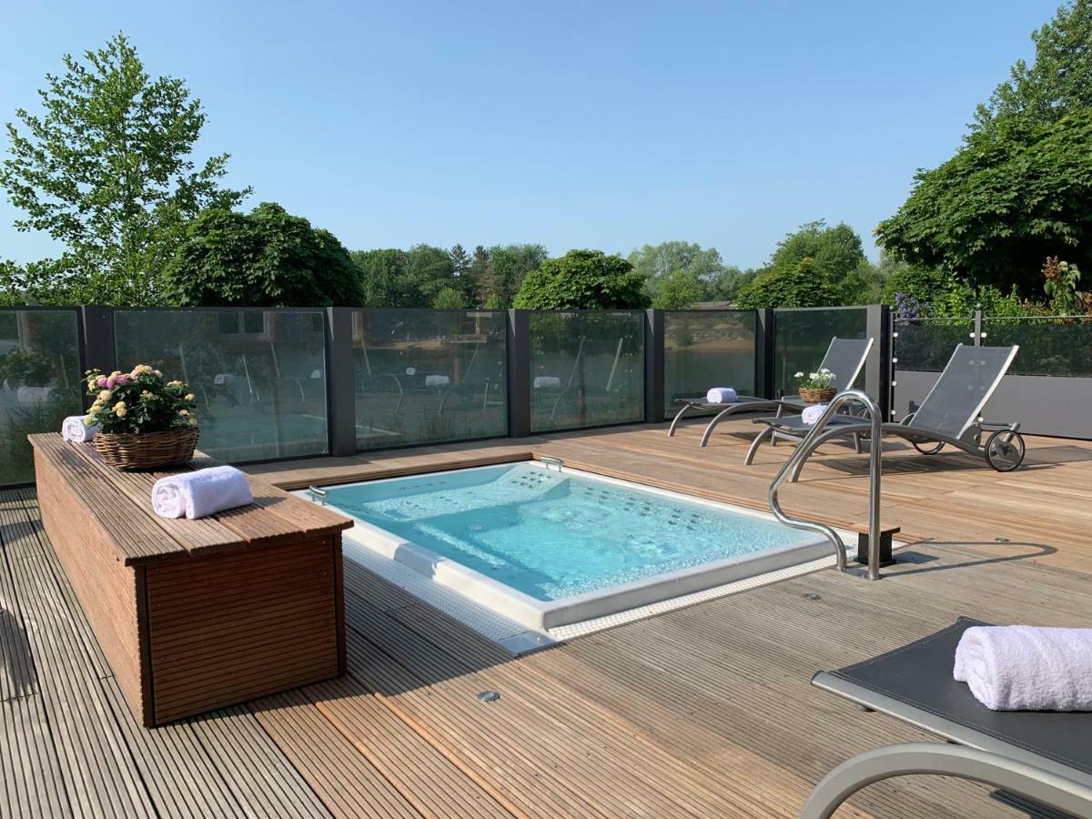 Seehotel Niedernberg - Das Dorf Am See Bagian luar foto